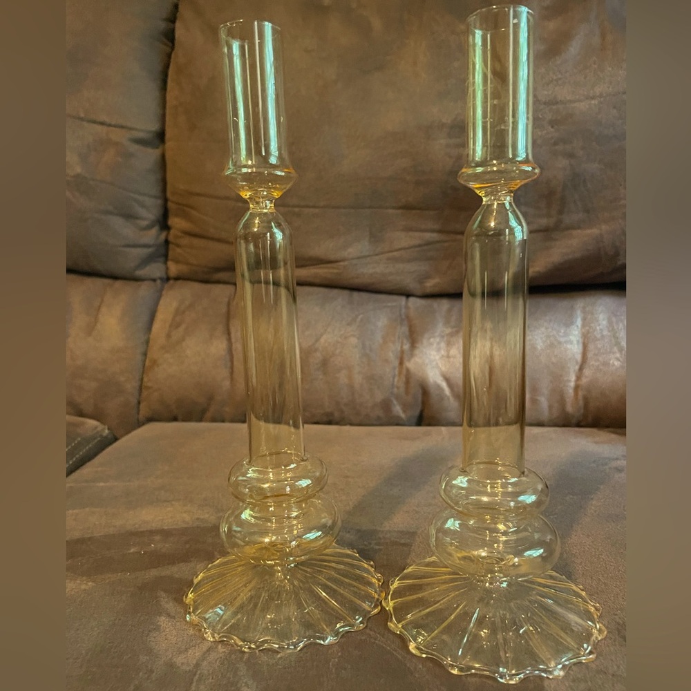 2 light Yellow hand blow glass candlestick holders.